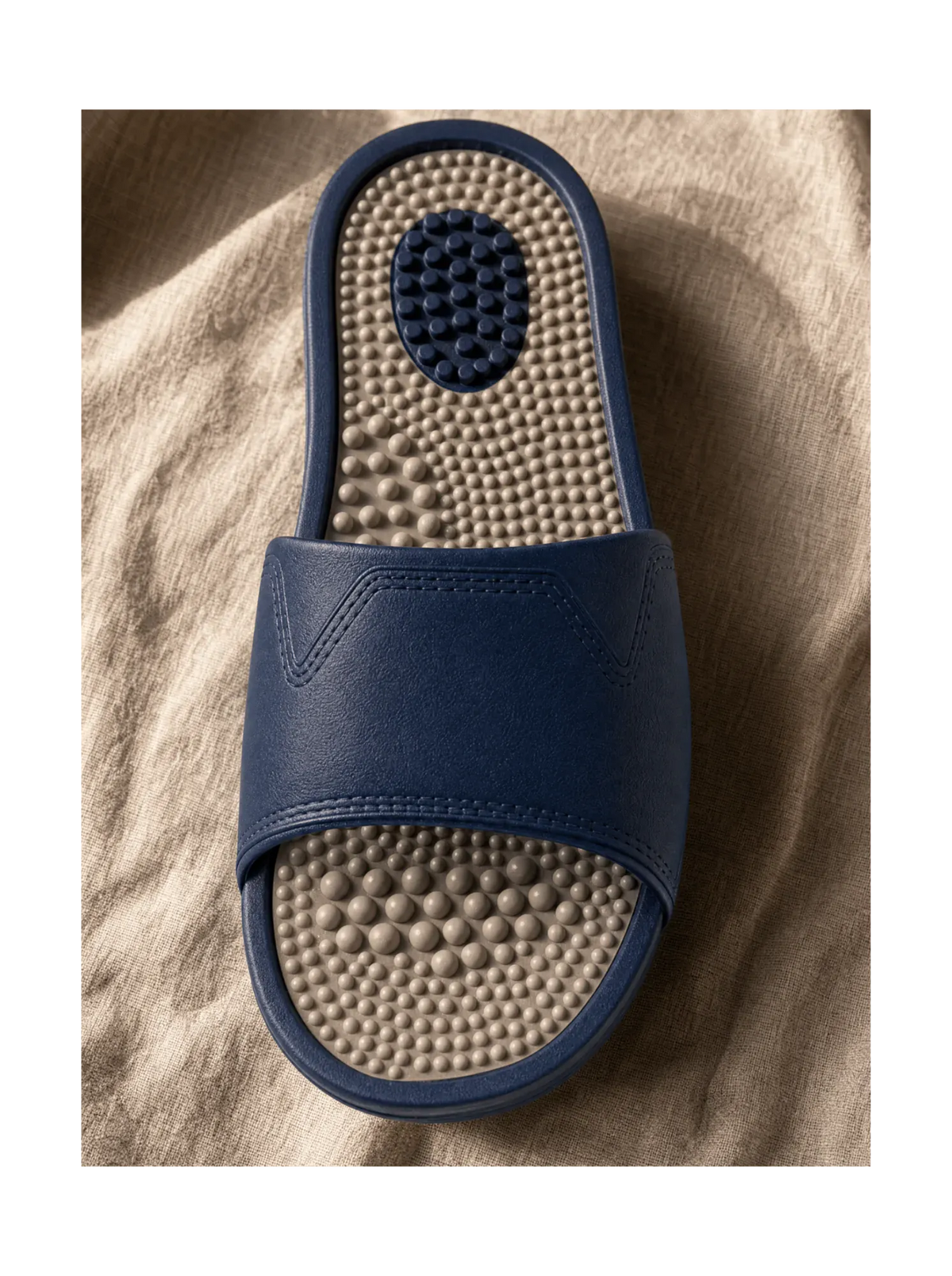Close-up of the Zenith Steelwater reflexology footbed — the acupressure nodules across the sole
