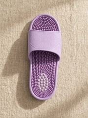Close-up of the Zenith reflexology footbed in Amethyst — acupressure nodules across the sole