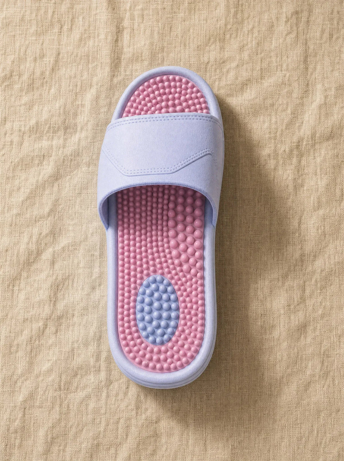Close-up of the Zenith reflexology footbed in Crestfall — acupressure nodules across the sole