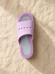 Close-up of the Meridian reflexology footbed in Nocturne — acupressure nodules across the sole